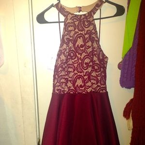 Cute short red dress.